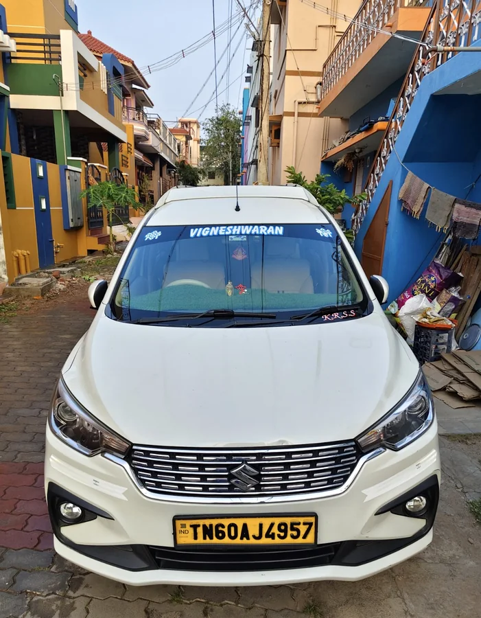 White New Ertiga rental vehicle from Vigneshwaran Tours and Travels